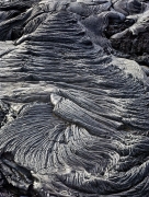 Fresh flow of Pahoehoe lava on the flanks of the active volcano Kilauea freezes in place as it was headed to the sea.  Wind so strong you couldn't stand up.  Big Island of Hawai'i.