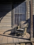 Rocking chair on the front porch looks out onto the big Junque collection at 5th and Myrtle in Goldfield, NV.  You will still find it here!  Lots of other curiosities as well.