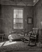 Strange objects hover in the corners.  Ghosts or just mildew on the film?  You judge.  The view from the rocking chair includes the church steeple and bedroom furniture with wallpaper.  Bodie, CA.