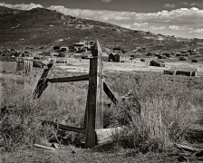 The fence around the graveyard is all but down for the ghost town of Bodie, CA.  The replacement fence is chain link!  Totally out of keeping with the little pioneer mining town but it is not subject to rot.