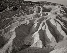 Often photographed, this 40 year old image from Zabriskie Point was taken before the area was completely loved to death.  Go there and compare the wear and tear now compared to the 1970’s.  Or see Ansel's images from the 1940's for even less path damage to the tops.  Death Valley NP, CA.