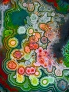 This enhanced color close-up is a stone cut by local artist Michelle Hoting. The jasper is part of a collection of uncut stones she inherited from her grandfather who founded the Corpus Christi Gem and Mineral Society in 1953. Her stone work and jewelry can be seen by visiting her studio in Santa Rosa by appointment. Michelle (707)791-4680.