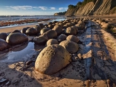 Looking north at a very low tide exposes the beach which looks as though it’s been scattered with oversized bowling balls.  These boulders have caused wild speculation wherever they’ve been discovered, with answers from aliens to dinosaur’s eggs. Bowling Ball Beach at Pt Arena, CA.