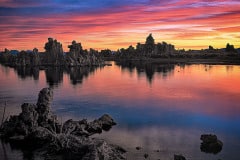 After the sun has well set, the glow on Mono Lake and its incredible Tufa formations makes for an other-worldly view.  Tufa is formed by interaction of freshwater springs and alkaline lake water and has become exposed due to diversion of water into the California aqueduct.
