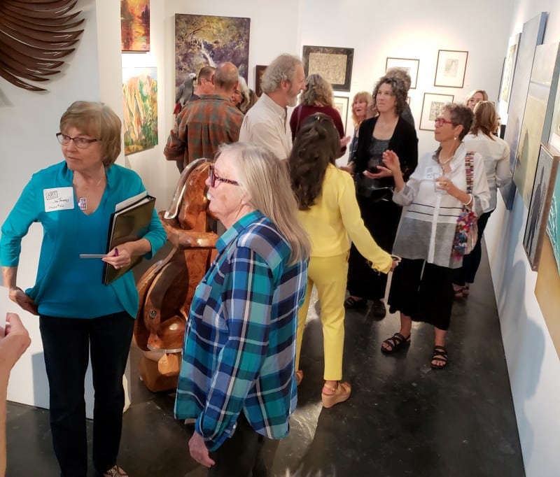 The milling crowd enjoying preview exhibit